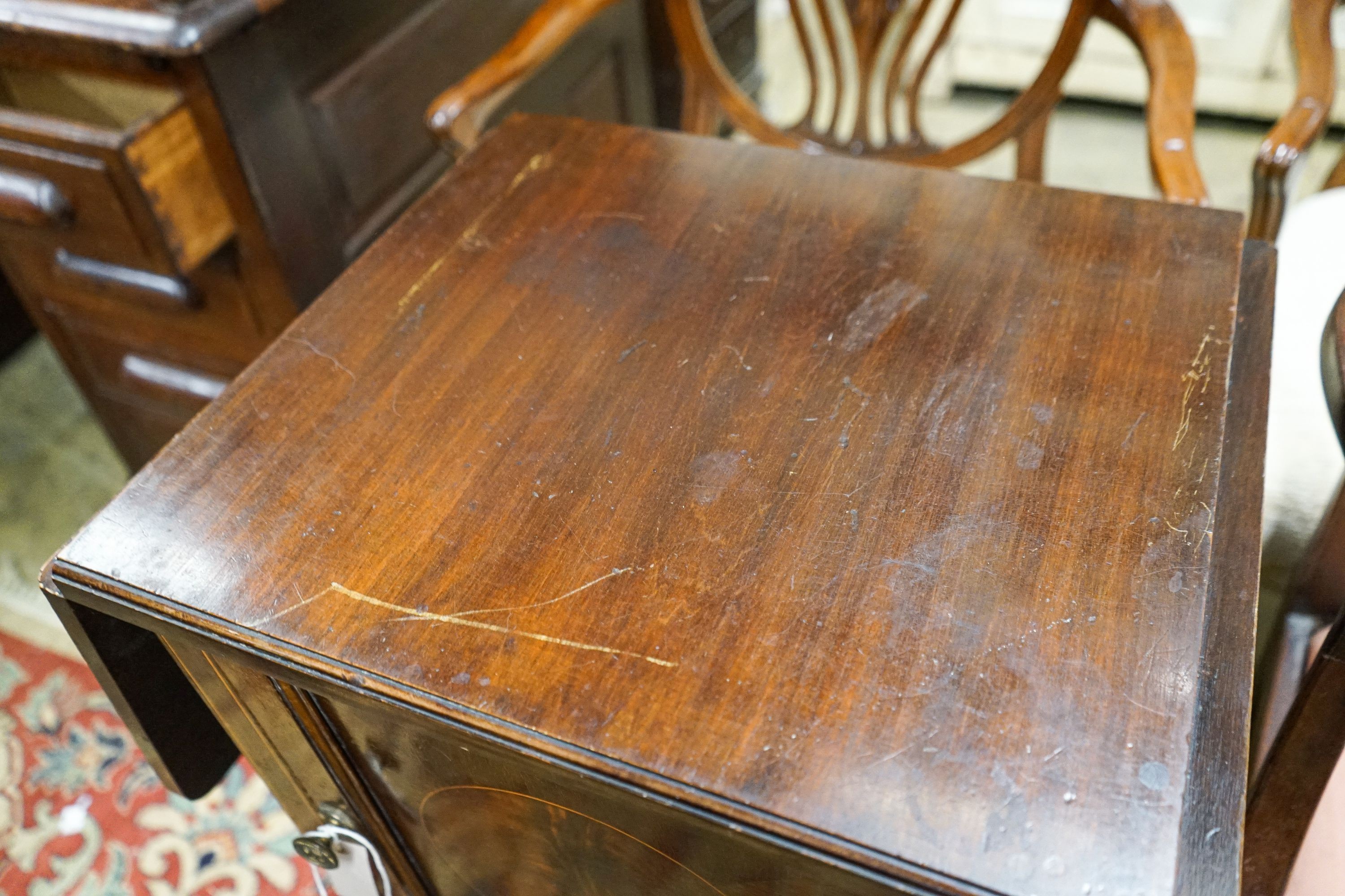 A pair of Hepplewhite style elbow chairs with oval backs, one other chair and a bedside commode cabinet (4)